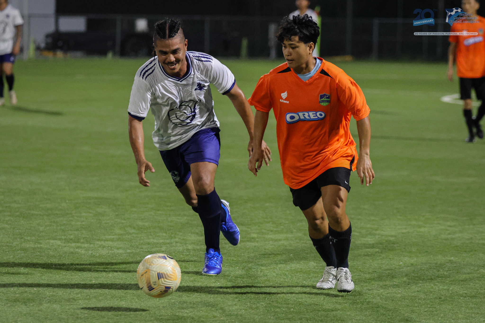 May be an image of 4 people, people playing soccer, people playing football and text
