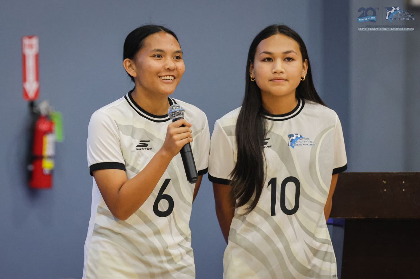 May be an image of 2 people, people playing voleyball and text