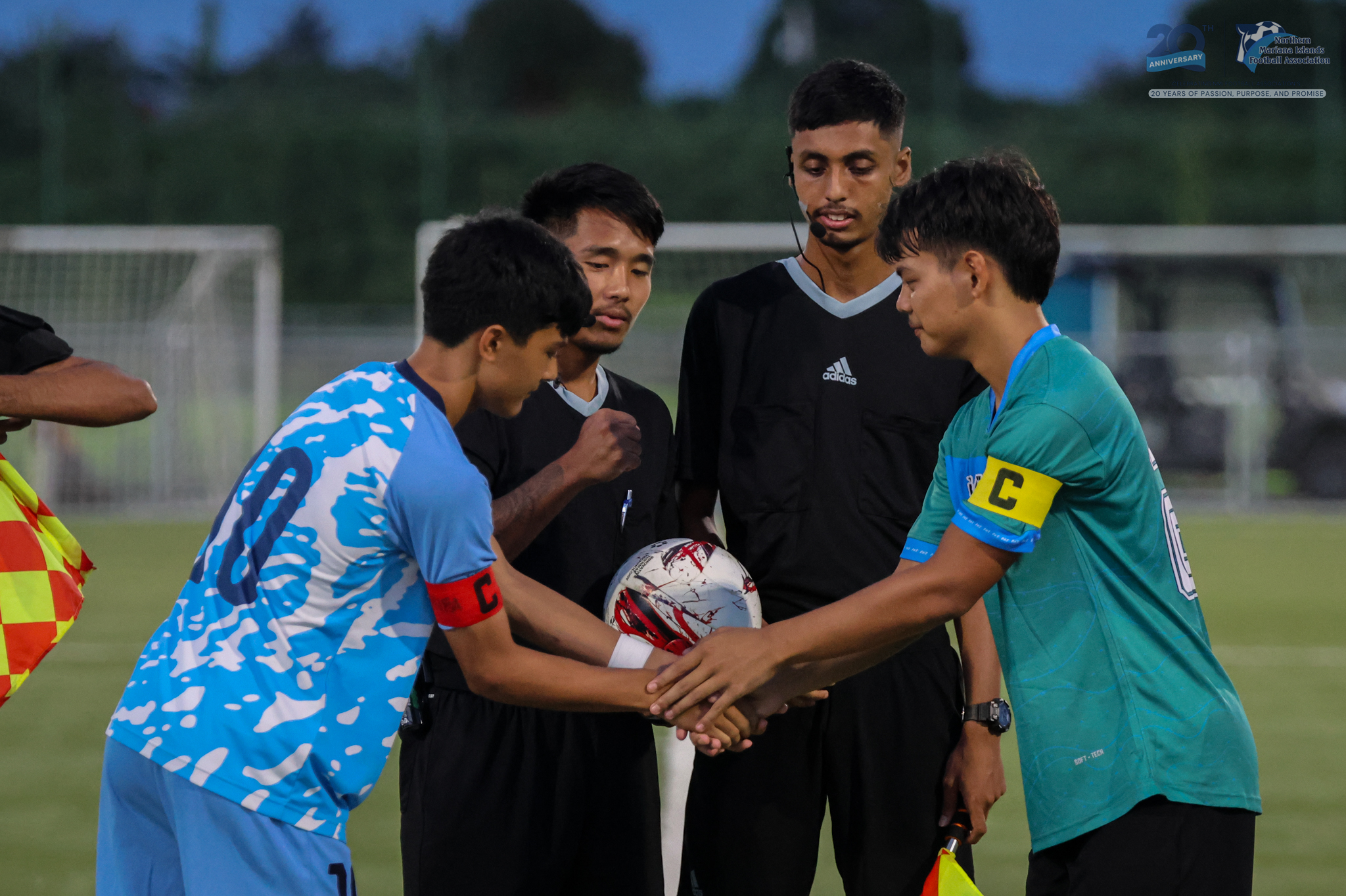 May be an image of 2 people, people playing soccer, people playing football and text