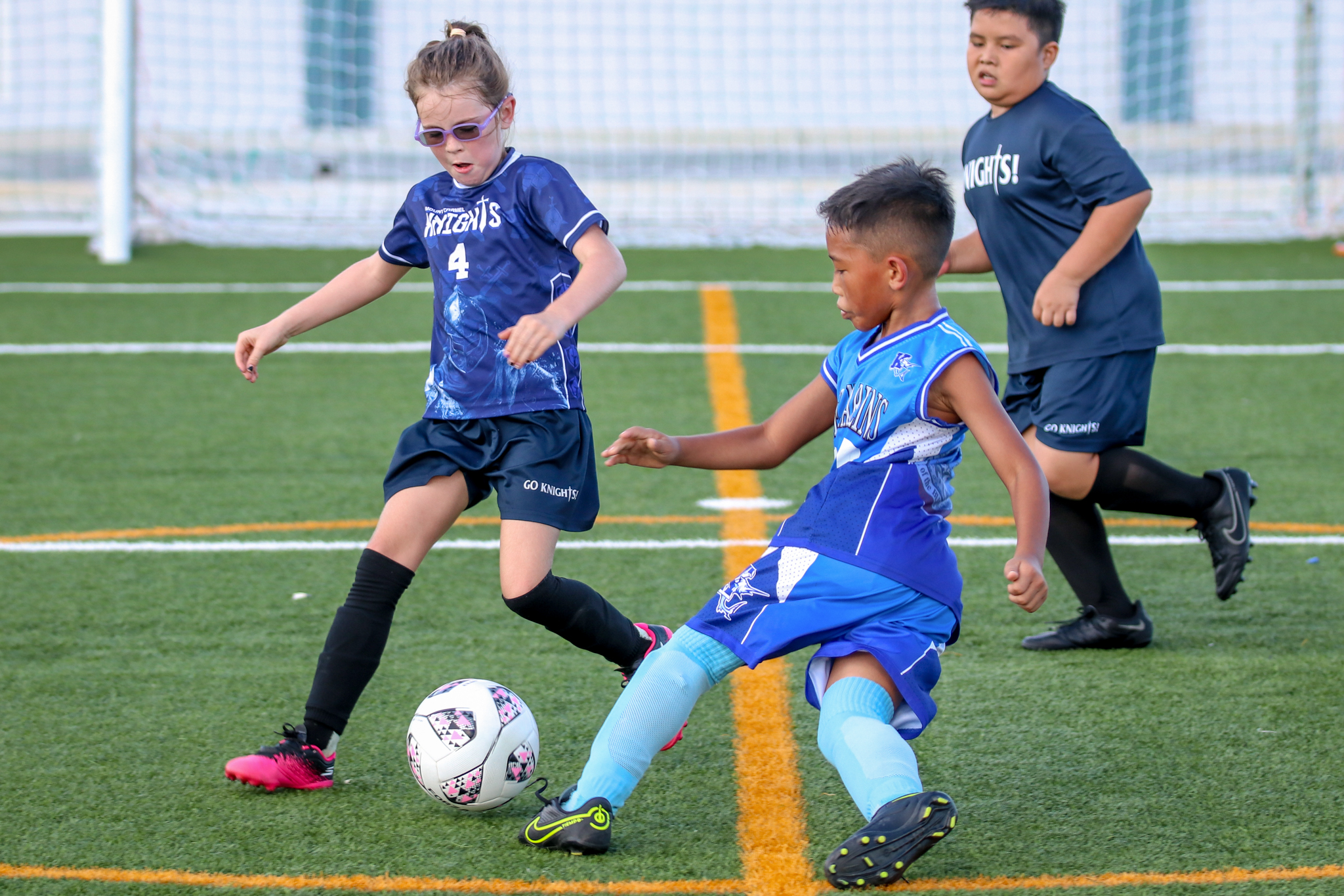 May be an image of 3 people, people playing football, people playing soccer and text that says 'INTENTS NGHTS! COKNIGHIS NGHTS GO И1'