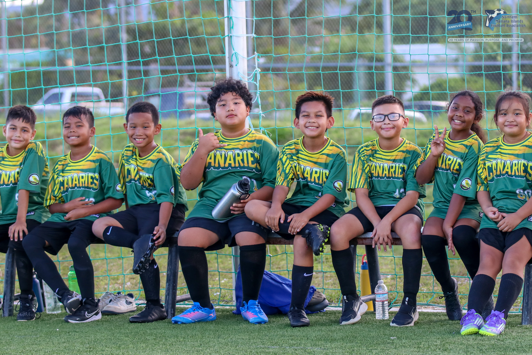 May be an image of 8 people, people playing football, people playing soccer and text