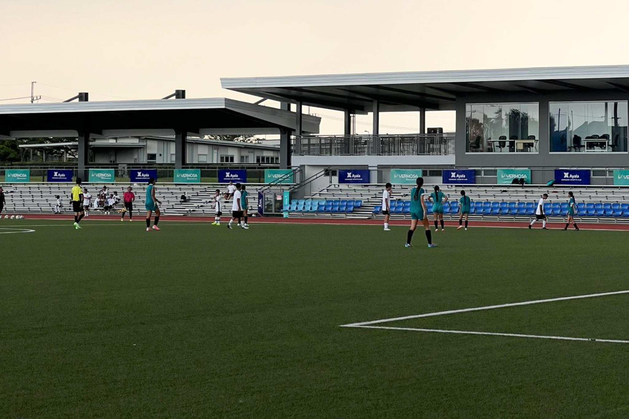 May be an image of 10 people, people playing football, people playing soccer and text