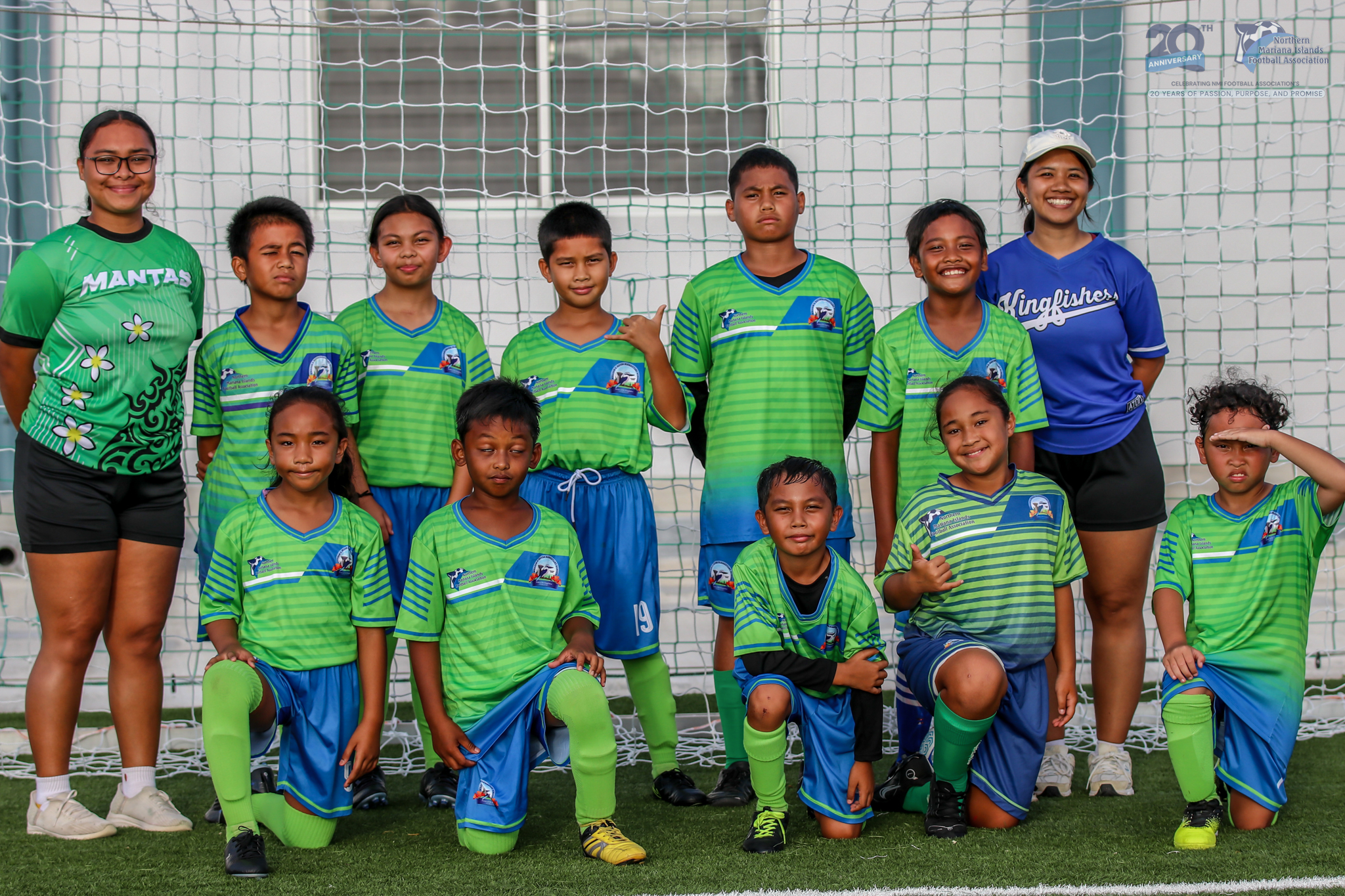 May be an image of 8 people, people playing soccer, people playing football and text