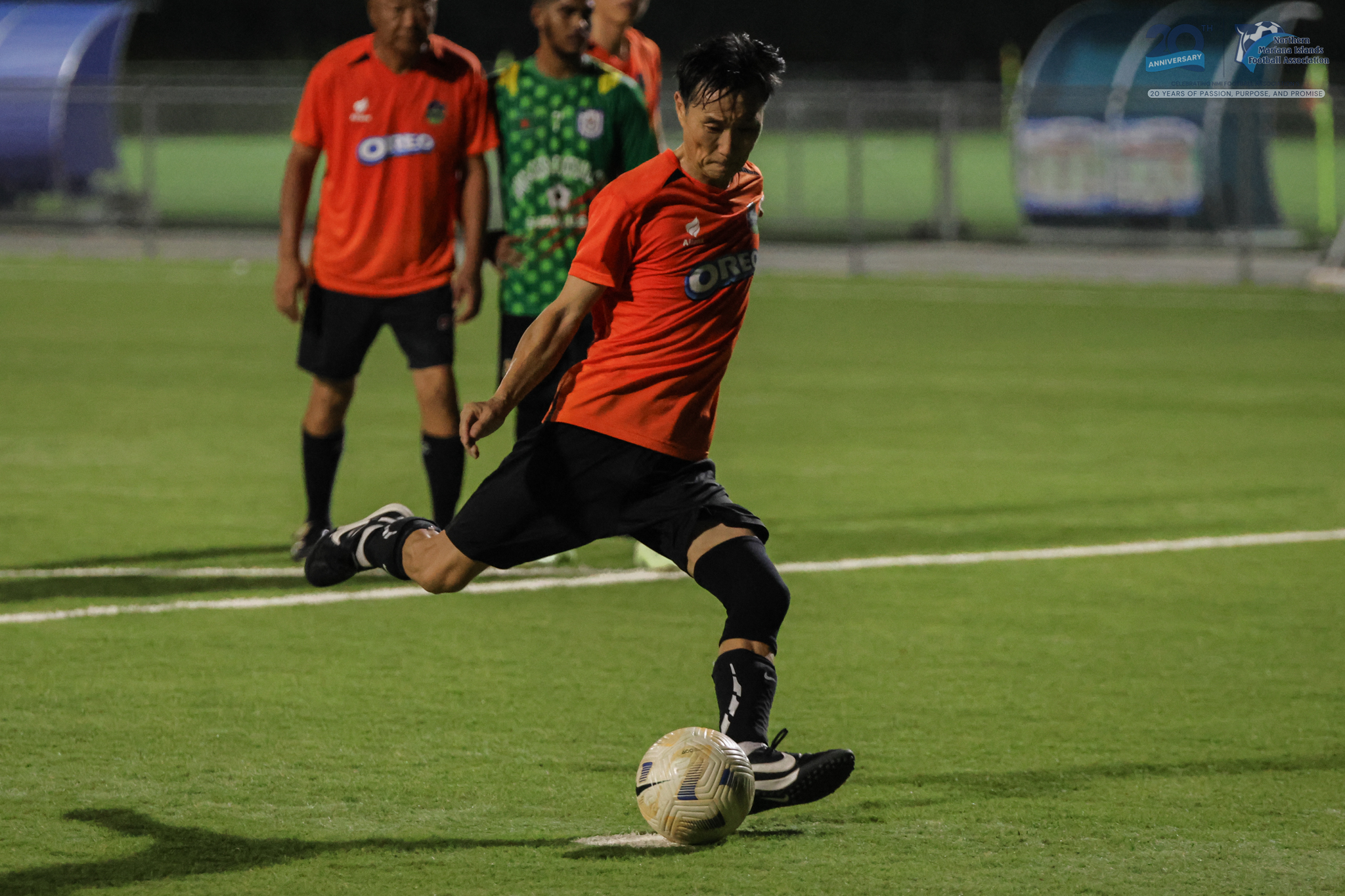May be an image of 2 people, people playing football, people playing soccer and text