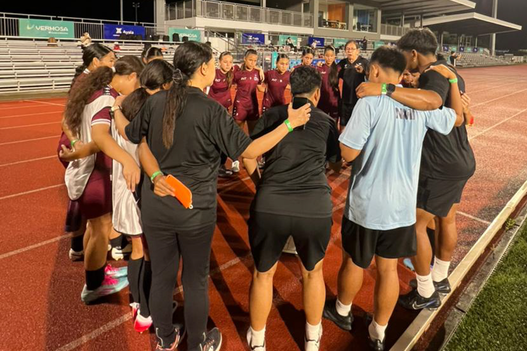 May be an image of 4 people and people playing soccer