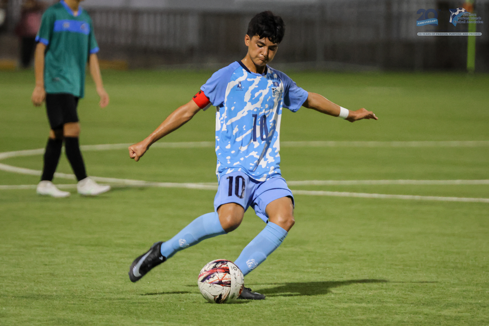 May be an image of 2 people, people playing football, people playing soccer and text