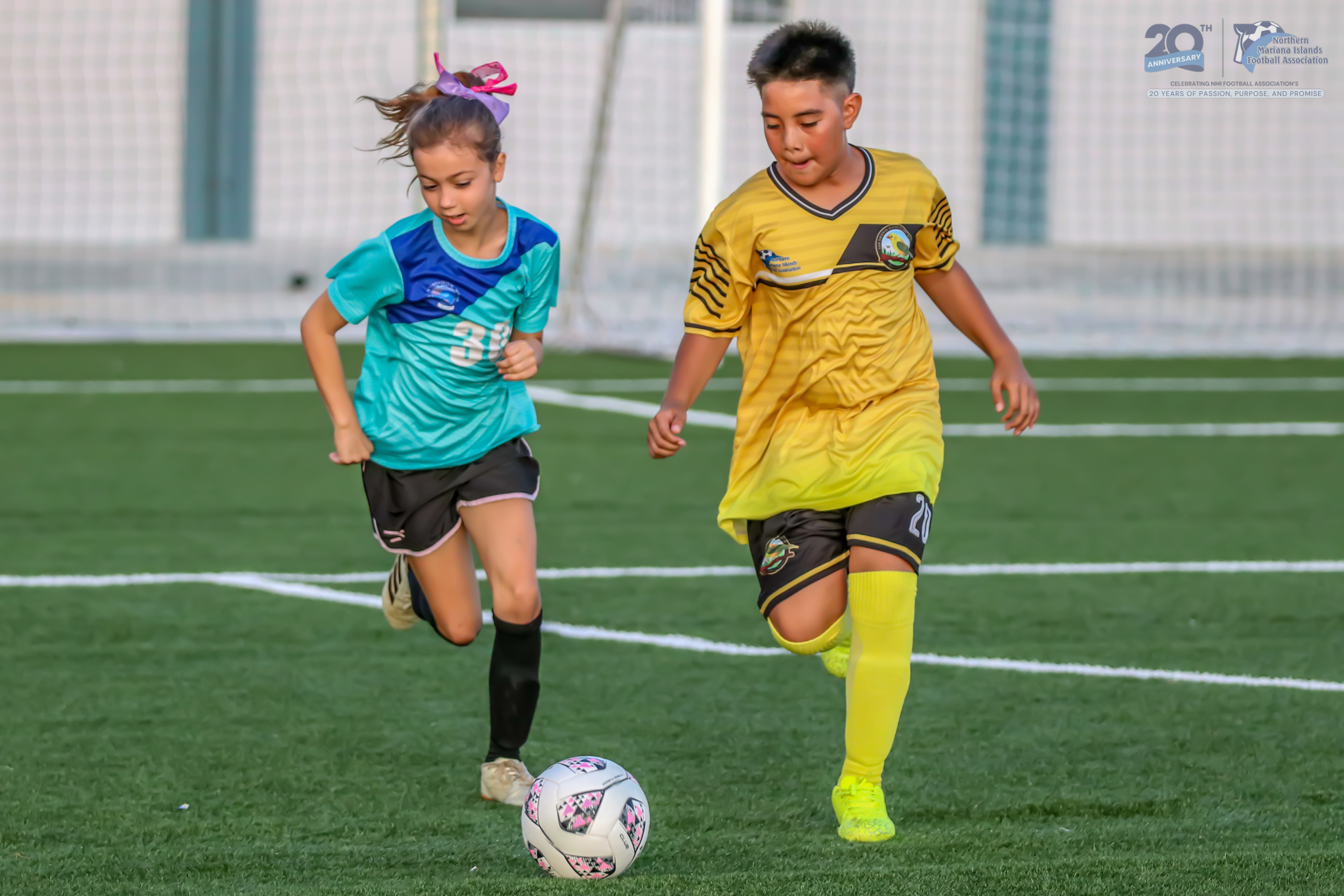 May be an image of 2 people, people playing soccer, people playing football and text