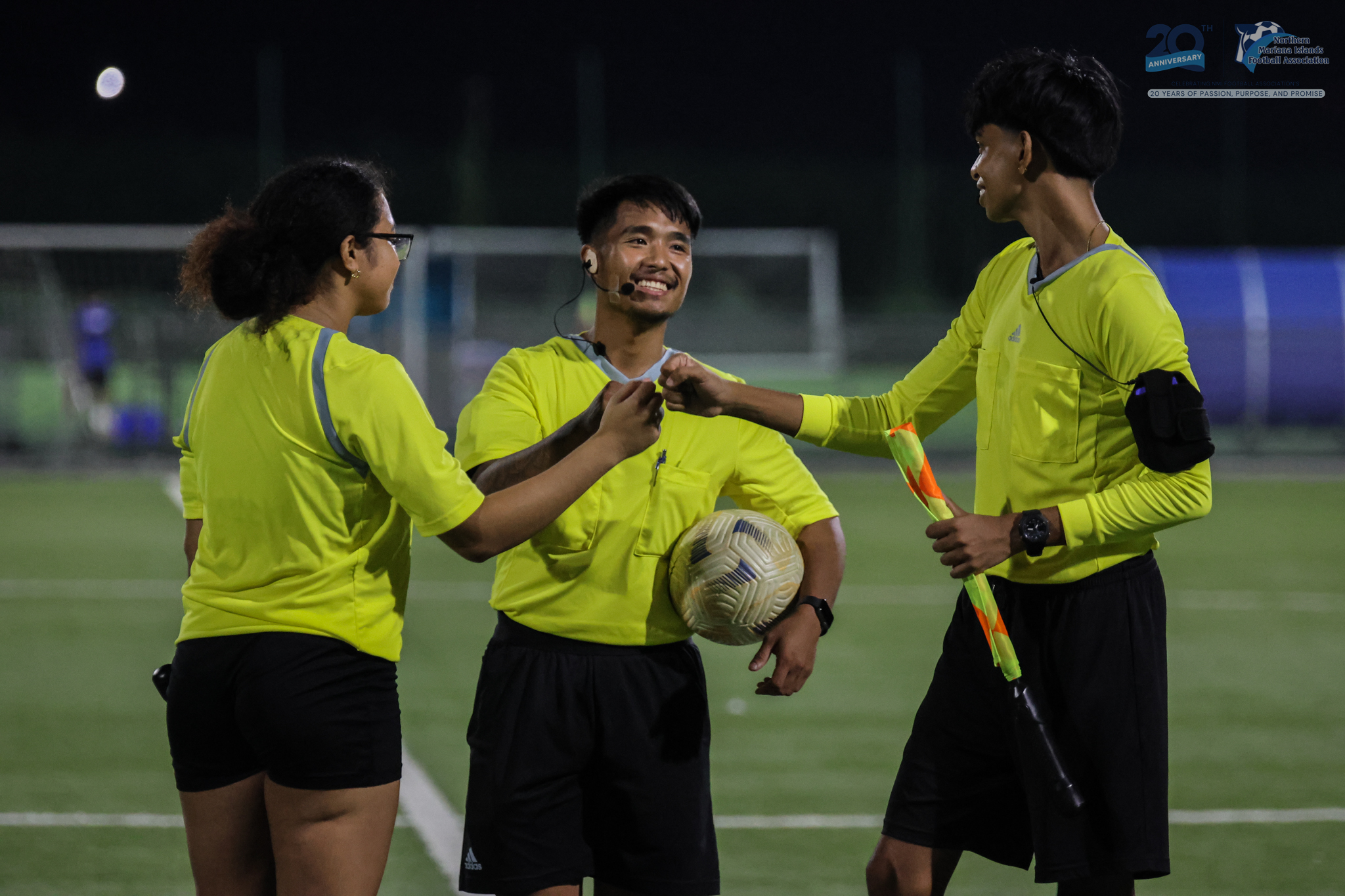 May be an image of 3 people, people playing football, people playing soccer and text