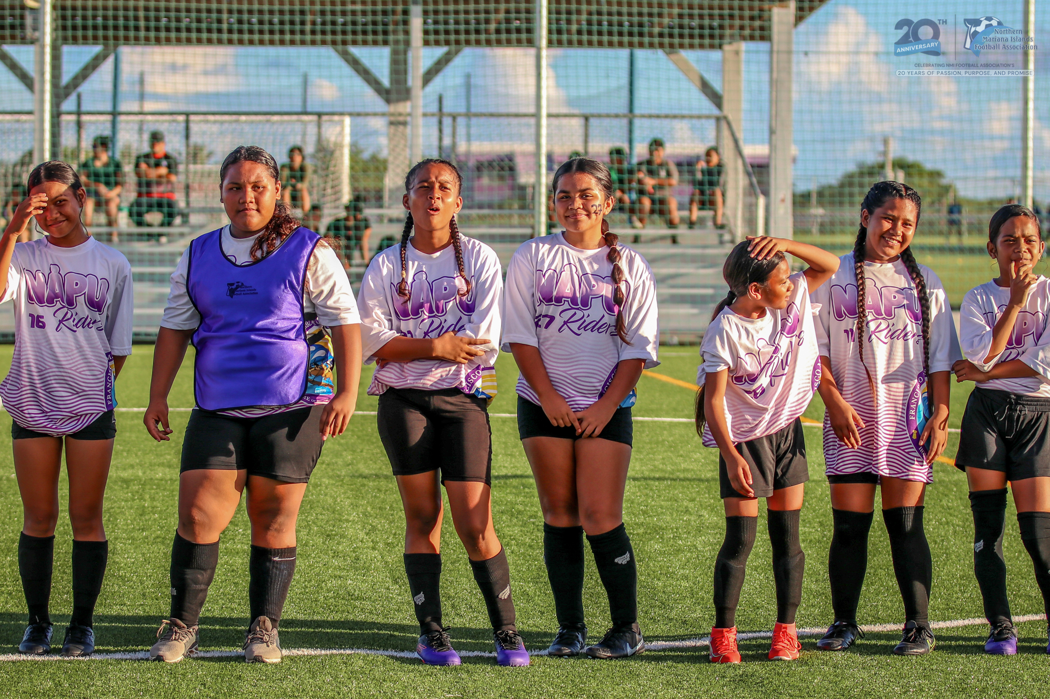 May be an image of 11 people, people playing soccer, people playing football and text