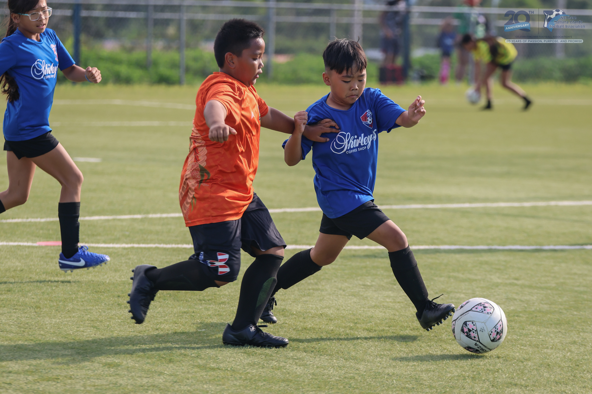 May be an image of 6 people, people playing football, people playing soccer and text