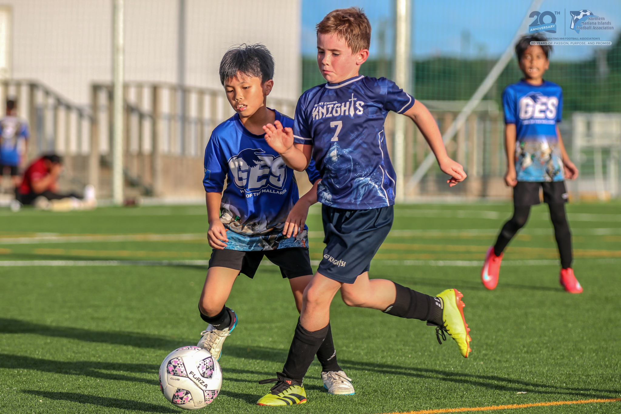 May be an image of 5 people, people playing soccer, people playing football and text