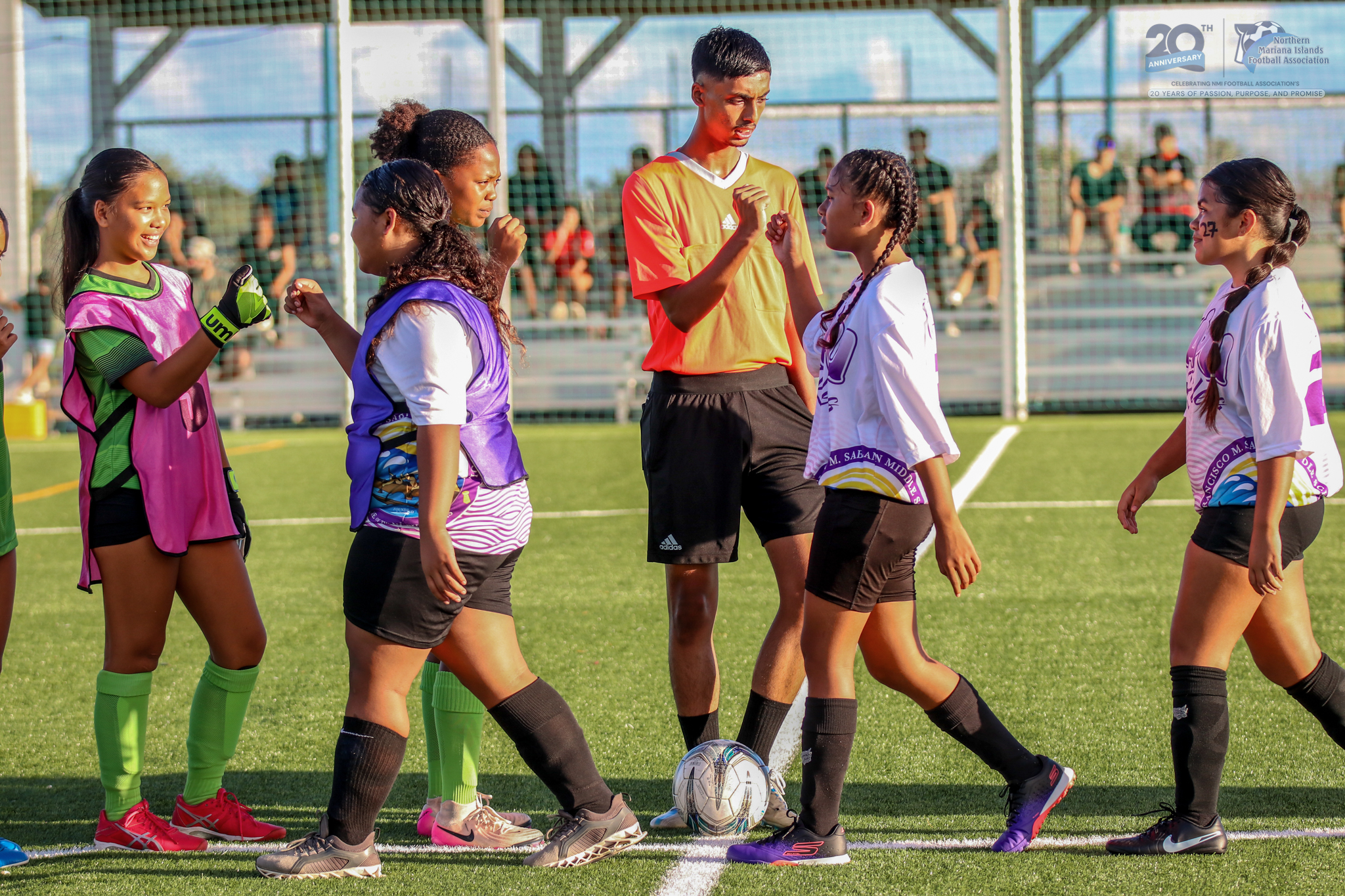 May be an image of 6 people, people playing football, people playing soccer and text