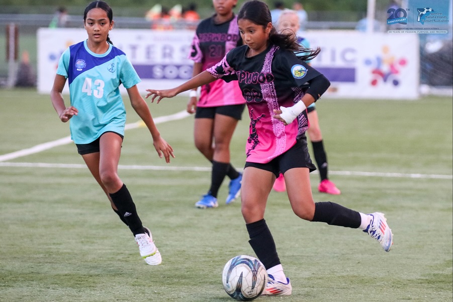 May be an image of football, soccer and text