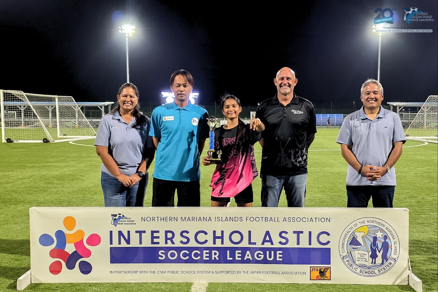 May be an image of football, soccer and text that says 'ANNIVERSARY 먹소 NORTHERN MARIANA ISLANDS FOOTBALL ASSOCIATION gromedasia INTERSCHOLASTIC AEN OF THE NORTHERN UARAN SOCCER LEAGUE ត្ INPARTNERSHIP WITH CNMI PUBLIC JAPANFOOTBALASSOCIATION SCHOOL SYESTEN'