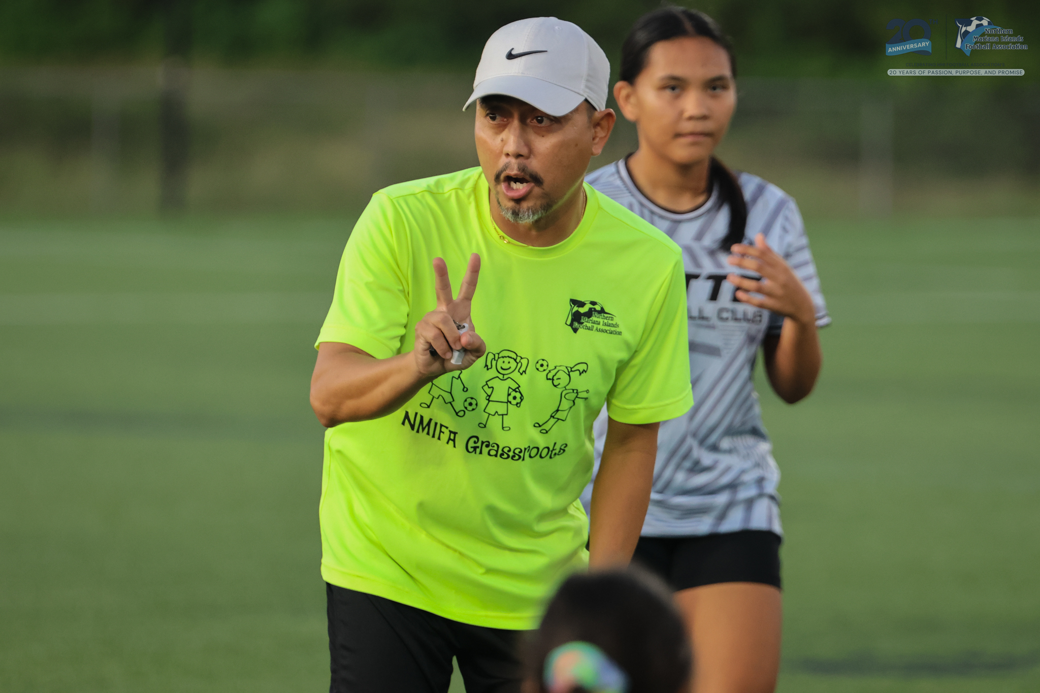 May be an image of football, tennis, soccer, grass and text