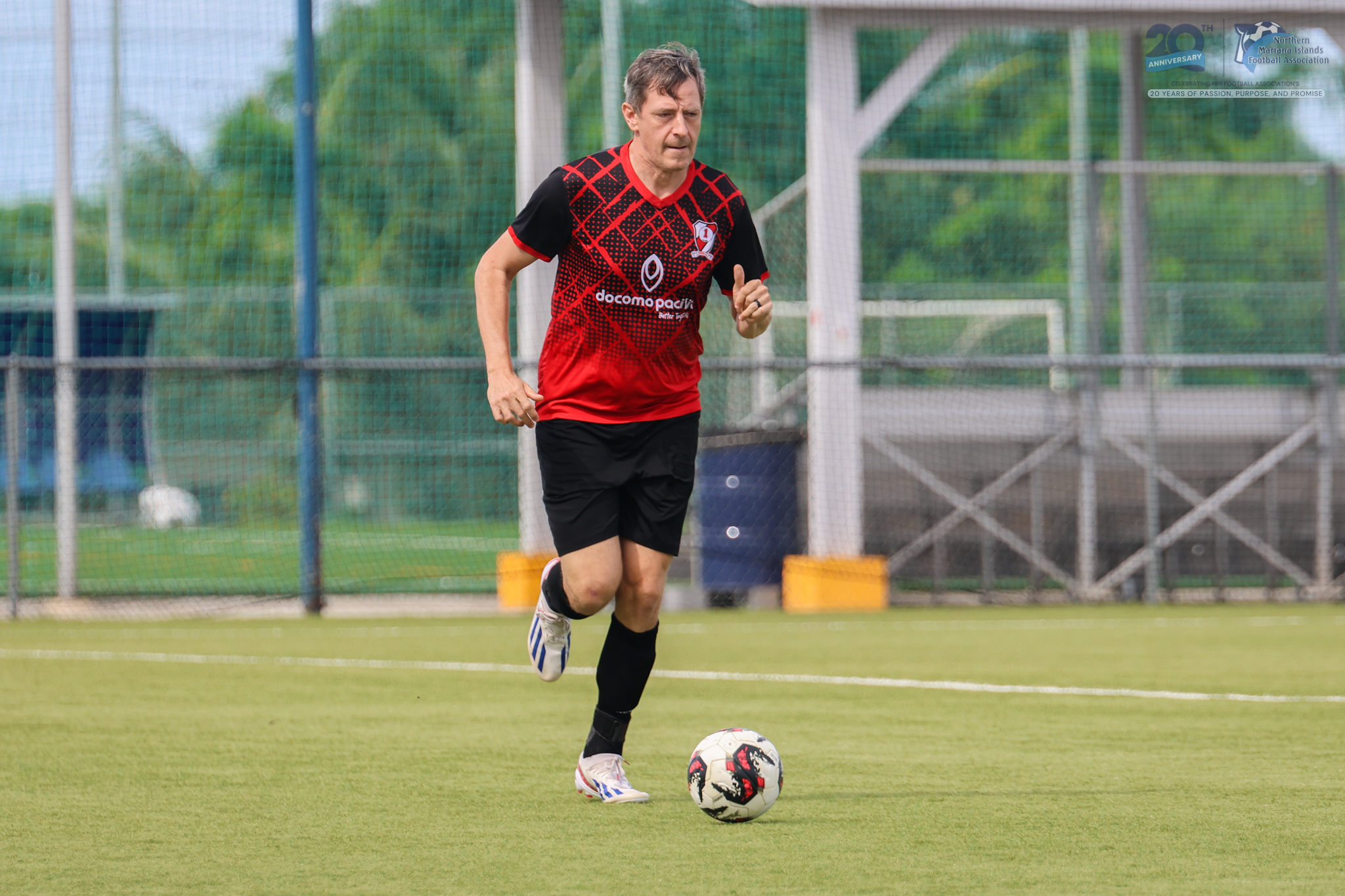 May be an image of football, soccer, cleats and text