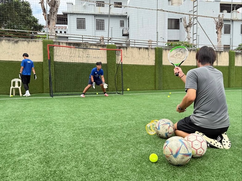 May be an image of football, soccer and text