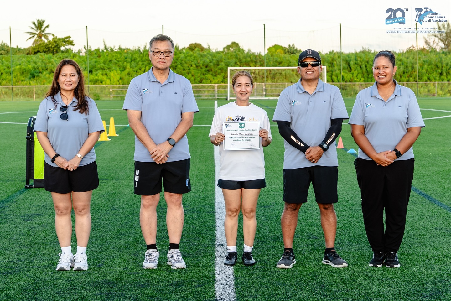 May be an image of soccer, tennis, grass and text