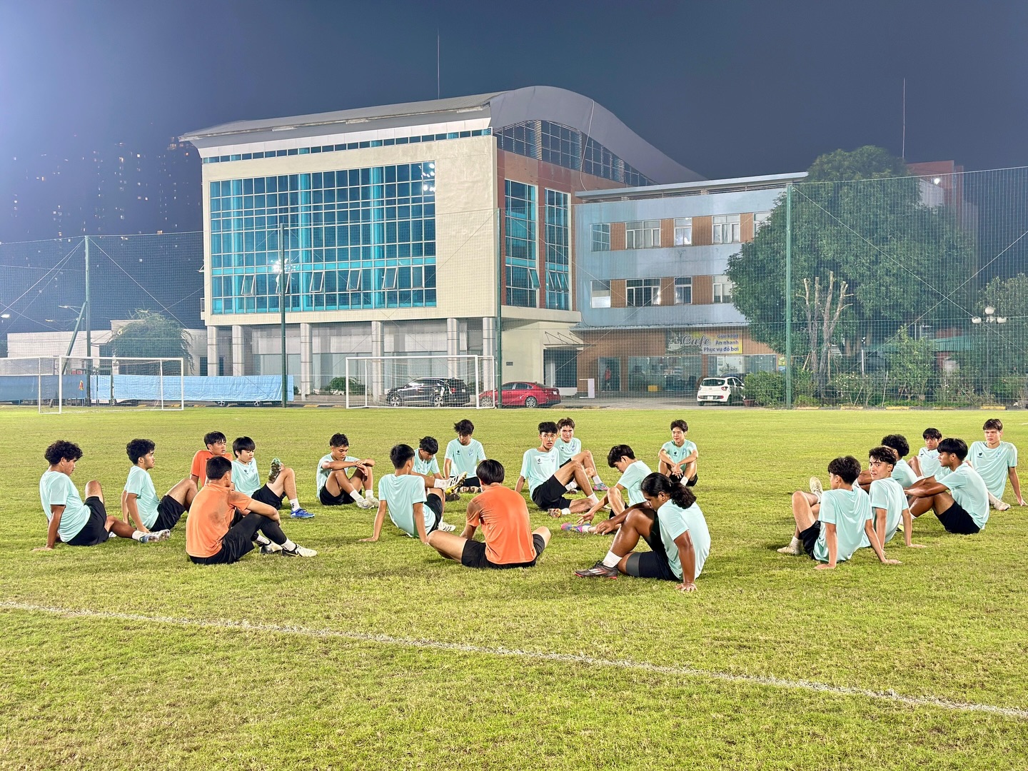May be an image of one or more people, people playing soccer and grass